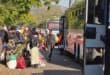 Malawian nationals queue to board buses and pack their belongings into the luggage compartments outside the temporary shelter in Pietermaritzburg as part of the voluntary repatriation process. Photo: Moeketsi Mamane