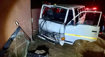 a white Toyota Hiace taxi crashed into the wall of a crèche