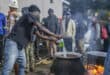 A volunteer pours milk to make tea for displaced foreign nationals, who have taken refuge in a park in Durban yesterday, after fleeing their homes amid fears of xenophobic attacks. Hundreds of foreign nationals await repatriation to Malawi from South Africa following xenophobic violence in the country. Foreign nationals have told of intimidation and beatings by mobs going door-to-door to tell them to leave by June 30, a ‘deadline’ regularly broadcast across social media, even though it has no official backing. Ghana, Mozambique and Malawi are among countries that have repatriated hundreds of their nationals this month. Photo: RAJESH JANTILAL