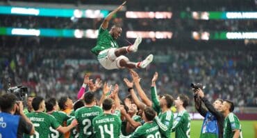 Players of the Mexico national team toss Julian Quinones #16 into the air to celebrate their victory over Ecuador after the FIFA World Cup 2026 round of 32 match at Mexico City Stadium on June 30, 2026, in Mexico City, Mexico. Photo: AFP