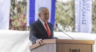 Israel's Prime Minister Benjamin Netanyahu speaks during a cornerstone laying ceremony for the Atarot Heritage Center at an abandon airport in East Jerusalem near the separation wall with the Israeli occupied West Bank city of Ramallah on July 5, 2026. (Photo by ilia YEFIMOVICH / AFP)
