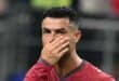 Portugal's forward #07 Cristiano Ronaldo reacts after losing the 2026 World Cup round of 16 football match between Portugal and Spain at the Dallas Stadium in Arlington on July 6, 2026. (Photo by RONALDO SCHEMIDT / AFP)