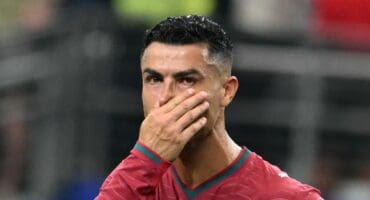 Portugal's forward #07 Cristiano Ronaldo reacts after losing the 2026 World Cup round of 16 football match between Portugal and Spain at the Dallas Stadium in Arlington on July 6, 2026. (Photo by RONALDO SCHEMIDT / AFP)