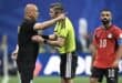 Egypt's head coach Hossam Hassan speaks with French referee Francois Letexier as Egypt's forward #10 Mohamed Salah looks on during the 2026 World Cup round of 16 football match between Argentina and Egypt at Atlanta Stadium in Atlanta on July 7, 2026. (Photo by ROBERTO SCHMIDT / AFP)