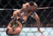 LAS VEGAS, NEVADA - JULY 11: Max Holloway of the United States lands a punch against Conor McGregor of Ireland in their welterweight bout during UFC 329 at T-Mobile Arena on July 11, 2026 in Las Vegas, Nevada. Ian Maule/Getty Images/AFP (Photo by Ian Maule / GETTY IMAGES NORTH AMERICA / Getty Images via AFP)