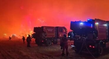 This screen grab taken from handout video footage released on July 17, 2026 by Spain's Military Emergencies Unit (UME) shows the military unit fighting a massive wildfire through the night in a sparsely populated part of the Aragon region in the country's northeast, after the blaze doubled in size overnight to scorch over 12,000 hectares. Photo: AFP