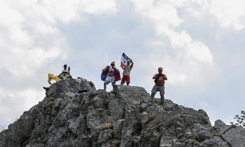 Spectators stand atop a rock formation along the roadside during the 15th stage of the 113th edition of the Tour de France cycling race, 183,9 km between Champagnole and Plateau de Solaison in the Jura mountains, on July 19, 2026. (Photo by Anne-Christine POUJOULAT / AFP) Related content Photos cycling - tdf - 2026 - stage 15 A spectators cheers from a balcony across from Saint-Michel church in Morbier as riders cycle past during the 15th stage of the 113th edition of the Tour de France cycling race, 183,9 km between Champagnole and Plateau de Solaison in the Jura mountains, on July 19, 2026. cycling - tdf - 2026 - stage 15 Spectators line the race route in front of a bar during the 15th stage of the 113th edition of the Tour de France cycling race, 183,9 km between Champagnole and Plateau de Solaison in the Jura mountains, on July 19, 2026. cycling - tdf - 2026 - stage 15 A spectator stands atop a tractor as the pack of riders (peloton) cycles past during the 15th stage of the 113th edition of the Tour de France cycling race, 183,9 km between Champagnole and Plateau de Solaison in the Jura mountains, on July 19, 2026. cycling - tdf - 2026 - stage 15 Spectators ring bells along the roadside as the pack of riders (peloton) cycles past during the 15th stage of the 113th edition of the Tour de France cycling race, 183,9 km between Champagnole and Plateau de Solaison in the Jura mountains, on July 19, 2026. cycling - tdf - 2026 - stage 15 Spectators ring bells along the roadside as the pack of riders (peloton) cycles past during the 15th stage of the 113th edition of the Tour de France cycling race, 183,9 km between Champagnole and Plateau de Solaison in the Jura mountains, on July 19, 2026. cycling - tdf - 2026 - stage 15 The pack of riders (peloton) cycle at the start of the 15th stage of the 113th edition of the Tour de France cycling race, 183,9 km between Champagnole and Plateau de Solaison in the Jura mountains, on July 19, 2026. cycling - tdf - 2026 - spectators AFP presents a reportage of 20 photographs of the 2026 Tour de France cycling race by Anne-Christine Poujoulat, Loic Venance and Jeff Pachoud, of spectators lining the route to catch a glimpse of the peloton. cycling - tdf - 2026 - spectators Spectators cheer in a makeshift pool in a trailer along the race route as the pack of riders (peloton) cycles past during the 6th stage of the 113th edition of the Tour de France cycling race, 186,2 km between Pau and Gavarnie-Gèdre in the French Pyrenees, on July 9, 2026. cycling - tdf - 2026 - spectators Spectators ride bicycles hanging from a telehandler along the race route at the start of the 10th stage of the 113th edition of the Tour de France cycling race, 166,6 km between Aurillac and Le Lioran in the Massif Central, on July 14, 2026. cycling - tdf - 2026 - spectators Spectators cheer from atop an elevated bucket draped in a French flag for Bastille day along the race route during the 10th stage of the 113th edition of the Tour de France cycling race, 166,6 km between Aurillac and Le Lioran in the Massif Central, on July 14, 2026. cycling - tdf - 2026 - spectators TotalEnergies team's French rider Thibault Guernalec, Caja Rural - Seguros RGA team's Czech rider Jakub Otruba and Lotto Intermarché team's Belgian rider Liam Slock cycle in a breakaway during the 8th stage of the 113th edition of the Tour de France cycling race, 180,4 km between Perigueux and Bergerac in southwestern France, on July 11, 2026. cycling - tdf - 2026 - best of - week 2 The pack of riders (peloton) cycle past a classic car parked along the race route during the 12th stage of the 113th edition of the Tour de France cycling race, 181 km between Circuit de Nevers Magny-Cours and Chalon-sur-Saône in central France, on July 16, 2026. cycling - tdf - 2026 - best of - week 2 The pack of riders (peloton) cycles during the 10th stage of the 113th edition of the Tour de France cycling race, 166,6 km between Aurillac and Le Lioran in the Massif Central, on July 14, 2026. cycling - tdf - 2026 - best of - week 2 UAE Team Emirates - XRG's Slovenian rider Tadej Pogacar wearing the overall leader's yellow jersey cycles during the 10th stage of the 113th edition of the Tour de France cycling race, 166,6 km between Aurillac and Le Lioran in the Massif Central, on July 14, 2026. cycling - tdf - 2026 - best of - week 2 A lead breakaway is silhouetted as they cycle past a sunflower field during the 11th stage of the 113th edition of the Tour de France cycling race, 161,3 km between Vichy and Nevers in central France, on July 15, 2026. cycling - tdf - 2026 - best of - week 2 A spectator waves a Burgundy flag during the 12th stage of the 113th edition of the Tour de France cycling race, 179,1 km between Circuit de Nevers Magny-Cours and Chalon-sur-Saône in central France, on July 16, 2026. cycling - tdf - 2026 - best of - week 2 The pack of riders (peloton) cycles on the Magny-Cours race track at the start of the 12th stage of the 113th edition of the Tour de France cycling race, 181 km between Circuit de Nevers Magny-Cours and Chalon-sur-Saône in central France, on July 16, 2026. cycling - tdf - 2026 - best of - week 2 Spectators watch the pack of riders (peloton) cycle past during the 12th stage of the 113th edition of the Tour de France cycling race, 179,1 km between Circuit de Nevers Magny-Cours and Chalon-sur-Saône in central France, on July 16, 2026. cycling - tdf - 2026 - best of - week 2 The pack of riders (peloton) cycles past un sunflower field during the 12th stage of the 113th edition of the Tour de France cycling race, 181 km between Circuit de Nevers Magny-Cours and Chalon-sur-Saône in central France, on July 16, 2026. cycling - tdf - 2026 - spectators Spectators atop a Citroen 2CV wave flags as the pack of riders (peloton) cycles past during the 14th stage of the 113th edition of the Tour de France cycling race, 155,3 km between Mulhouse and Le Markstein in the Vosges mountains, on July 18, 2026. cycling - tdf - 2026 - best of - week 2 UAE Team Emirates - XRG's Slovenian rider Tadej Pogacar cycles to the finish line to win the 10th stage of the 113th edition of the Tour de France cycling race, 166,6 km between Aurillac and Le Lioran in the Massif Central, on July 14, 2026. cycling - tdf - 2026 - best of - week 2 The pack of riders (peloton) is silhouetted as it cycles during the 11th stage of the 113th edition of the Tour de France cycling race, 161,3 km between Vichy and Nevers in central France, on July 15, 2026. cycling - tdf - 2026 - best of - week 2 The pack of riders (peloton) cycles during the 13th stage of the 113th edition of the Tour de France cycling race, 205,8 km between Dole and Belfort in eastern France, on July 17, 2026. cycling - tdf - 2026 - best of - week 2 The pack of riders (peloton) cycles in Decize during the 12th stage of the 113th edition of the Tour de France cycling race, 181 km between Circuit de Nevers Magny-Cours and Chalon-sur-Saône in central France, on July 16, 2026. cycling - tdf - 2026 - best of - week 2 A bystander balances a bicycle on his chin as the pack of riders (peloton) cycles past during the 13th stage of the 113th edition of the Tour de France cycling race, 205,8 km between Dole and Belfort in eastern France, on July 17, 2026. topshot - cycling - tdf - 2026 - stage 14 UAE Team Emirates - XRG's Slovenian rider Tadej Pogacar wearing the overall leader's yellow jersey cycles to the finish line to win the 14th stage of the 113th edition of the Tour de France cycling race, 155,3 km between Mulhouse and Le Markstein in the Vosges mountains, on July 18, 2026. topshot - cycling - tdf - 2026 - stage 14 Decathlon CMA CGM Team's French rider Paul Seixas celebrates on the podium with the best young rider's white jersey after the 14th stage of the 113th edition of the Tour de France cycling race, 155,3 km between Mulhouse and Le Markstein in the Vosges mountains, on July 18, 2026. topshot - cycling - tdf - 2026 - stage 14 UAE Team Emirates - XRG's Slovenian rider Tadej Pogacar celebrates on the podium with the best climber's polka dot (dotted) jersey after the 14th stage of the 113th edition of the Tour de France cycling race, 155,3 km between Mulhouse and Le Markstein in the Vosges mountains, on July 18, 2026. cycling - tdf - 2026 - stage 14 UAE Team Emirates - XRG's Slovenian rider Tadej Pogacar wearing the overall leader's yellow jersey attacks to take the lead in a lone breakaway in the final kilometers of the 14th stage of the 113th edition of the Tour de France cycling race, 155,3 km between Mulhouse and Le Markstein in the Vosges mountains, on July 18, 2026. cycling - tdf - 2026 - stage 14 UAE Team Emirates - XRG's Slovenian rider Tadej Pogacar wearing the overall leader's yellow jersey attacks to take the lead in a lone breakaway ahead of Team Visma | Lease a Bike team's Danish rider Jonas Vingegaard wearing the climber's dotted "King of the Mountains" jersey in the final kilometers of the 14th stage of the 113th edition of the Tour de France cycling race, 155,3 km between Mulhouse and Le Markstein in the Vosges mountains, on July 18, 2026. cycling - tdf - 2026 - stage 14 UAE Team Emirates - XRG's Slovenian rider Tadej Pogacar wearing the overall leader's yellow jersey attacks to take the lead in a lone breakaway in the final kilometers of the 14th stage of the 113th edition of the Tour de France cycling race, 155,3 km between Mulhouse and Le Markstein in the Vosges mountains, on July 18, 2026. cycling - tdf - 2026 - stage 14 UAE Team Emirates - XRG's Slovenian rider Tadej Pogacar wearing the overall leader's yellow jersey attacks to take the lead in a lone breakaway in the final kilometers of the 14th stage of the 113th edition of the Tour de France cycling race, 155,3 km between Mulhouse and Le Markstein in the Vosges mountains, on July 18, 2026. cycling - tdf - 2026 - stage 14 UAE Team Emirates - XRG's Slovenian rider Tadej Pogacar wearing the overall leader's yellow jersey attacks to take the lead in a lone breakaway in the final kilometers of the 14th stage of the 113th edition of the Tour de France cycling race, 155,3 km between Mulhouse and Le Markstein in the Vosges mountains, on July 18, 2026. cycling - tdf - 2026 - stage 14 UAE Team Emirates - XRG's Slovenian rider Tadej Pogacar wearing the overall leader's yellow jersey attacks to take the lead in a lone breakaway in the final kilometers of the 14th stage of the 113th edition of the Tour de France cycling race, 155,3 km between Mulhouse and Le Markstein in the Vosges mountains, on July 18, 2026. cycling - tdf - 2026 - stage 14 UAE Team Emirates - XRG's Slovenian rider Tadej Pogacar wearing the overall leader's yellow jersey attacks to take the lead in a lone breakaway ahead of Team Visma | Lease a Bike team's Danish rider Jonas Vingegaard wearing the climber's dotted "King of the Mountains" jersey in the final kilometers of the 14th stage of the 113th edition of the Tour de France cycling race, 155,3 km between Mulhouse and Le Markstein in the Vosges mountains, on July 18, 2026. cycling - tdf - 2026 - stage 14 UAE Team Emirates - XRG's Slovenian rider Tadej Pogacar wearing the overall leader's yellow jersey attacks to take the lead in a lone breakaway in the final kilometers of the 14th stage of the 113th edition of the Tour de France cycling race, 155,3 km between Mulhouse and Le Markstein in the Vosges mountains, on July 18, 2026. cycling - tdf - 2026 - stage 14 UAE Team Emirates - XRG's Slovenian rider Tadej Pogacar wearing the overall leader's yellow jersey attacks to take the lead in a lone breakaway in the final kilometers of the 14th stage of the 113th edition of the Tour de France cycling race, 155,3 km between Mulhouse and Le Markstein in the Vosges mountains, on July 18, 2026. topshot - cycling - tdf - 2026 - stage 14 UAE Team Emirates - XRG's Slovenian rider Tadej Pogacar wearing the overall leader's yellow jersey attacks to take the lead in a lone breakaway in the final kilometers of the 14th stage of the 113th edition of the Tour de France cycling race, 155,3 km between Mulhouse and Le Markstein in the Vosges mountains, on July 18, 2026. cycling - tdf - 2026 - stage 14 Lidl - Trek team's Danish rider Mads Pedersen celebrates on the podium with the best sprinter's green jersey after the 14th stage of the 113th edition of the Tour de France cycling race, 155,3 km between Mulhouse and Le Markstein in the Vosges mountains, on July 18, 2026. cycling - tdf - 2026 - stage 14 Lidl - Trek team's Danish rider Mads Pedersen celebrates on the podium with the best sprinter's green jersey after the 14th stage of the 113th edition of the Tour de France cycling race, 155,3 km between Mulhouse and Le Markstein in the Vosges mountains, on July 18, 2026. cycling - tdf - 2026 - stage 14 UAE Team Emirates - XRG's Austrian rider Felix Grossschartner cycles during the 14th stage of the 113th edition of the Tour de France cycling race, 155,3 km between Mulhouse and Le Markstein in the Vosges mountains, on July 18, 2026. cycling - tdf - 2026 - stage 14 EF Education - EasyPost team's Ecuadorian rider Richard Carapaz celebrates on the podium with the most combative rider's award after the 14th stage of the 113th edition of the Tour de France cycling race, 155,3 km between Mulhouse and Le Markstein in the Vosges mountains, on July 18, 2026. cycling - tdf - 2026 - stage 14 cycling - tdf - 2026 - stage 14 cycling - tdf - 2026 - stage 14 cycling - tdf - 2026 - stage 14 Decathlon CMA CGM Team's French rider Paul Seixas celebrates on the podium with the best young rider's white jersey after the 14th stage of the 113th edition of the Tour de France cycling race, 155,3 km between Mulhouse and Le Markstein in the Vosges mountains, on July 18, 2026. cycling - tdf - 2026 - stage 14 Decathlon CMA CGM Team's French rider Paul Seixas celebrates on the podium with the best young rider's white jersey after the 14th stage of the 113th edition of the Tour de France cycling race, 155,3 km between Mulhouse and Le Markstein in the Vosges mountains, on July 18, 2026. cycling - tdf - 2026 - stage 14 Decathlon CMA CGM Team's French rider Paul Seixas celebrates on the podium with the best young rider's white jersey after the 14th stage of the 113th edition of the Tour de France cycling race, 155,3 km between Mulhouse and Le Markstein in the Vosges mountains, on July 18, 2026. cycling - tdf - 2026 - stage 14 Decathlon CMA CGM Team's French rider Paul Seixas celebrates on the podium with the best young rider's white jersey after the 14th stage of the 113th edition of the Tour de France cycling race, 155,3 km between Mulhouse and Le Markstein in the Vosges mountains, on July 18, 2026. cycling - tdf - 2026 - stage 14 cycling - tdf - 2026 - stage 14 cycling - tdf - 2026 - stage 14 cycling - tdf - 2026 - stage 14 UAE Team Emirates - XRG's Slovenian rider Tadej Pogacar celebrates on the podium with the best climber's polka dot (dotted) jersey after the 14th stage of the 113th edition of the Tour de France cycling race, 155,3 km between Mulhouse and Le Markstein in the Vosges mountains, on July 18, 2026. cycling - tdf - 2026 - stage 14 UAE Team Emirates - XRG's Slovenian rider Tadej Pogacar celebrates on the podium with the overall leader's yellow jersey after the 14th stage of the 113th edition of the Tour de France cycling race, 155,3 km between Mulhouse and Le Markstein in the Vosges mountains, on July 18, 2026. cycling - tdf - 2026 - stage 14 UAE Team Emirates - XRG's Slovenian rider Tadej Pogacar celebrates on the podium with the overall leader's yellow jersey after the 14th stage of the 113th edition of the Tour de France cycling race, 155,3 km between Mulhouse and Le Markstein in the Vosges mountains, on July 18, 2026. cycling - tdf - 2026 - stage 14 UAE Team Emirates - XRG's Slovenian rider Tadej Pogacar celebrates on the podium with the overall leader's yellow jersey after the 14th stage of the 113th edition of the Tour de France cycling race, 155,3 km between Mulhouse and Le Markstein in the Vosges mountains, on July 18, 2026. cycling - tdf - 2026 - stage 14 UAE Team Emirates - XRG's Slovenian rider Tadej Pogacar celebrates on the podium with the overall leader's yellow jersey after the 14th stage of the 113th edition of the Tour de France cycling race, 155,3 km between Mulhouse and Le Markstein in the Vosges mountains, on July 18, 2026. cycling - tdf - 2026 - stage 14 UAE Team Emirates - XRG's Slovenian rider Tadej Pogacar celebrates on the podium after winning the 14th stage of the 113th edition of the Tour de France cycling race, 155,3 km between Mulhouse and Le Markstein in the Vosges mountains, on July 18, 2026. cycling - tdf - 2026 - stage 14 cycling - tdf - 2026 - stage 14 cycling - tdf - 2026 - stage 14 cycling - tdf - 2026 - best of - week 2 UAE Team Emirates - XRG's Slovenian rider Tadej Pogacar wearing the overall leader's yellow jersey attacks to take the lead in a lone breakaway in the final kilometers of the 14th stage of the 113th edition of the Tour de France cycling race, 155,3 km between Mulhouse and Le Markstein in the Vosges mountains, on July 18, 2026. cycling - tdf - 2026 - stage 14 UAE Team Emirates - XRG's Slovenian rider Tadej Pogacar wearing the overall leader's yellow jersey cycles in a lone lead breakaway to win the 14th stage of the 113th edition of the Tour de France cycling race, 155,3 km between Mulhouse and Le Markstein in the Vosges mountains, on July 18, 2026. cycling - tdf - 2026 - stage 14 Decathlon CMA CGM Team's French rider Paul Seixas chases down lead breakaway riders in the final ascent during the 14th stage of the 113th edition of the Tour de France cycling race, 155,3 km between Mulhouse and Le Markstein in the Vosges mountains, on July 18, 2026. cycling - tdf - 2026 - stage 14 EF Education - EasyPost team's Ecuadorian rider Richard Carapaz cycles in a lone breakaway in the final ascent during the 14th stage of the 113th edition of the Tour de France cycling race, 155,3 km between Mulhouse and Le Markstein in the Vosges mountains, on July 18, 2026. cycling - tdf - 2026 - stage 14 Uno-X Mobility team's Norwegian rider Tobias Halland Johannessen chases down the lead breakaway rider in the final ascent during the 14th stage of the 113th edition of the Tour de France cycling race, 155,3 km between Mulhouse and Le Markstein in the Vosges mountains, on July 18, 2026. cycling - tdf - 2026 - stage 14 UAE Team Emirates - XRG's Mexican rider Isaac Del Toro chases down lead breakaway riders in the final kilometers of the final ascent during the 14th stage of the 113th edition of the Tour de France cycling race, 155,3 km between Mulhouse and Le Markstein in the Vosges mountains, on July 18, 2026. cycling - tdf - 2026 - stage 14 Decathlon CMA CGM Team's French rider Paul Seixas chases down lead breakaway riders in the final kilometers of the final ascent during the 14th stage of the 113th edition of the Tour de France cycling race, 155,3 km between Mulhouse and Le Markstein in the Vosges mountains, on July 18, 2026. cycling - tdf - 2026 - stage 14 Decathlon CMA CGM Team's French rider Paul Seixas chases down lead breakaway riders in the final kilometers of the final ascent during the 14th stage of the 113th edition of the Tour de France cycling race, 155,3 km between Mulhouse and Le Markstein in the Vosges mountains, on July 18, 2026. cycling - tdf - 2026 - stage 14 Decathlon CMA CGM Team's French rider Paul Seixas chases down lead breakaway riders in the final kilometers of the final ascent during the 14th stage of the 113th edition of the Tour de France cycling race, 155,3 km between Mulhouse and Le Markstein in the Vosges mountains, on July 18, 2026. cycling - tdf - 2026 - stage 14 EF Education - EasyPost team's Ecuadorian rider Richard Carapaz cycles in a lone breakaway in the final ascent during the 14th stage of the 113th edition of the Tour de France cycling race, 155,3 km between Mulhouse and Le Markstein in the Vosges mountains, on July 18, 2026. cycling - tdf - 2026 - stage 14 EF Education - EasyPost team's Ecuadorian rider Richard Carapaz cycles in a lone breakaway in the final ascent during the 14th stage of the 113th edition of the Tour de France cycling race, 155,3 km between Mulhouse and Le Markstein in the Vosges mountains, on July 18, 2026. cycling - tdf - 2026 - stage 14 UAE Team Emirates - XRG's Slovenian rider Tadej Pogacar wearing the overall leader's yellow jersey attacks to take the lead in a lone breakaway in the final kilometers of the 14th stage of the 113th edition of the Tour de France cycling race, 155,3 km between Mulhouse and Le Markstein in the Vosges mountains, on July 18, 2026. cycling - tdf - 2026 - stage 14 UAE Team Emirates - XRG's Slovenian rider Tadej Pogacar wearing the overall leader's yellow jersey celebrates after winning the 14th stage of the 113th edition of the Tour de France cycling race, 155 km between Mulhouse and Le Markstein in the Vosges mountains, on July 18, 2026. cycling - tdf - 2026 - stage 14 UAE Team Emirates - XRG's Slovenian rider Tadej Pogacar wearing the overall leader's yellow jersey celebrates after winning the 14th stage, next to Decathlon CMA CGM Team's French rider Paul Seixas (L) during the 113th edition of the Tour de France cycling race, 155 km between Mulhouse and Le Markstein in the Vosges mountains, on July 18, 2026. cycling - tdf - 2026 - stage 14 UAE Team Emirates - XRG's Slovenian rider Tadej Pogacar wearing the overall leader's yellow jersey celebrates after winning the 14th stage of the 113th edition of the Tour de France cycling race, 155 km between Mulhouse and Le Markstein in the Vosges mountains, on July 18, 2026. cycling - tdf - 2026 - stage 14 UAE Team Emirates - XRG's Slovenian rider Tadej Pogacar wearing the overall leader's yellow jersey celebrates with UAE Team Emirates - XRG's Mexican rider Isaac Del Toro (R) after winning the 14th stage of the 113th edition of the Tour de France cycling race, 155 km between Mulhouse and Le Markstein in the Vosges mountains, on July 18, 2026. cycling - tdf - 2026 - stage 14 UAE Team Emirates - XRG's Slovenian rider Tadej Pogacar wearing the overall leader's yellow jersey celebrates after winning the 14th stage of the 113th edition of the Tour de France cycling race, 155 km between Mulhouse and Le Markstein in the Vosges mountains, on July 18, 2026. cycling - tdf - 2026 - stage 14 Spectators crowd the hillside in the final ascent of the 14th stage of the 113th edition of the Tour de France cycling race, 155,3 km between Mulhouse and Le Markstein in the Vosges mountains, on July 18, 2026. cycling - tdf - 2026 - stage 14 UAE Team Emirates - XRG's Mexican rider Isaac Del Toro cycles to the finish line of the 14th stage of the 113th edition of the Tour de France cycling race, 155,3 km between Mulhouse and Le Markstein in the Vosges mountains, on July 18, 2026. cycling - tdf - 2026 - stage 14 Decathlon CMA CGM Team's French rider Paul Seixas cycles to the finish line of the 14th stage of the 113th edition of the Tour de France cycling race, 155,3 km between Mulhouse and Le Markstein in the Vosges mountains, on July 18, 2026. cycling - tdf - 2026 - stage 14 UAE Team Emirates - XRG's Slovenian rider Tadej Pogacar wearing the overall leader's yellow jersey attacks to take the lead in a lone breakaway in the final kilometers of the 14th stage of the 113th edition of the Tour de France cycling race, 155,3 km between Mulhouse and Le Markstein in the Vosges mountains, on July 18, 2026. cycling - tdf - 2026 - stage 14 Team Visma | Lease a Bike's Danish rider Jonas Vingegaard wearing the climber's dotted "King of the Mountains" jersey cycles to the finish of the 14th stage of the 113th edition of the Tour de France cycling race, 155,3 km between Mulhouse and Le Markstein in the Vosges mountains, on July 18, 2026. cycling - tdf - 2026 - stage 14 Team Visma | Lease a Bike's Danish rider Jonas Vingegaard wearing the climber's dotted "King of the Mountains" jersey cycles to the finish of the 14th stage of the 113th edition of the Tour de France cycling race, 155,3 km between Mulhouse and Le Markstein in the Vosges mountains, on July 18, 2026. cycling - tdf - 2026 - stage 14 Team Visma | Lease a Bike's Danish rider Jonas Vingegaard wearing the climber's dotted "King of the Mountains" jersey cycles to the finish of the 14th stage of the 113th edition of the Tour de France cycling race, 155,3 km between Mulhouse and Le Markstein in the Vosges mountains, on July 18, 2026. cycling - tdf - 2026 - stage 14 Team Visma | Lease a Bike's Danish rider Jonas Vingegaard wearing the climber's dotted "King of the Mountains" jersey cycles to the finish of the 14th stage of the 113th edition of the Tour de France cycling race, 155,3 km between Mulhouse and Le Markstein in the Vosges mountains, on July 18, 2026. cycling - tdf - 2026 - stage 14 UAE Team Emirates - XRG's Slovenian rider Tadej Pogacar wearing the overall leader's yellow jersey cycles to the finish line to win the 14th stage of the 113th edition of the Tour de France cycling race, 155,3 km between Mulhouse and Le Markstein in the Vosges mountains, on July 18, 2026. cycling - tdf - 2026 - stage 14 UAE Team Emirates - XRG's Slovenian rider Tadej Pogacar wearing the overall leader's yellow jersey cycles to the finish line to win the 14th stage of the 113th edition of the Tour de France cycling race, 155,3 km between Mulhouse and Le Markstein in the Vosges mountains, on July 18, 2026. cycling - tdf - 2026 - stage 14 cycling - tdf - 2026 - stage 14 cycling - tdf - 2026 - stage 14 topshot - cycling - tdf - 2026 - stage 14 topshot - cycling - tdf - 2026 - stage 14 cycling - tdf - 2026 - stage 14 cycling - tdf - 2026 - stage 14 cycling - tdf - 2026 - stage 14 cycling - tdf - 2026 - stage 14 UAE Team Emirates - XRG's Slovenian rider Tadej Pogacar wearing the overall leader's yellow jersey attacks to take the lead in a lone breakaway in the final kilometers of the 14th stage of the 113th edition of the Tour de France cycling race, 155,3 km between Mulhouse and Le Markstein in the Vosges mountains, on July 18, 2026. cycling - tdf - 2026 - stage 14 UAE Team Emirates - XRG's Slovenian rider Tadej Pogacar wearing the overall leader's yellow jersey cycles to the finish line to win the 14th stage of the 113th edition of the Tour de France cycling race, 155,3 km between Mulhouse and Le Markstein in the Vosges mountains, on July 18, 2026. cycling - tdf - 2026 - stage 14 UAE Team Emirates - XRG's Slovenian rider Tadej Pogacar wearing the overall leader's yellow jersey cycles to the finish line to win the 14th stage of the 113th edition of the Tour de France cycling race, 155,3 km between Mulhouse and Le Markstein in the Vosges mountains, on July 18, 2026. cycling - tdf - 2026 - stage 14 UAE Team Emirates - XRG's Slovenian rider Tadej Pogacar wearing the overall leader's yellow jersey cycles to the finish line to win the 14th stage of the 113th edition of the Tour de France cycling race, 155,3 km between Mulhouse and Le Markstein in the Vosges mountains, on July 18, 2026.
