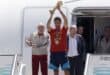 Spain's national football team's coach Luis de la Fuente (L), Spain's midfielder Rodri (C) and President of the Spanish Football Federation Rafael Louzan (3L) pose with their trophy upon their arrival from the US after winning the 2026 World Cup, in Madrid Barajas' airport, on July 20, 2026.