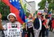 Demonstrators hold signs in support of ousted Venezuelan president Nicholas Maduro and his wife Cilia Flores, outside the Daniel Patrick Moynihan Federal Courthouse in New York City on July 22, 2026.