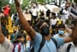 A Cockroach Janta Party (CJP) supporter shouts slogans at Jantar Mantar in New Delhi on July 23, 2026 during the ongoing protest to demand the resignation of India's Education Minister Dharmendra Pradhan over alleged NEET exam irregularities.