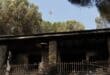 A Canadair firefighting aircraft flies over a burned house following a devastating wildfire in Pelayos de la Presa, 65 kilometers west of Madrid, on July 26, 2026.