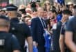 French international football player Zinedine Zidane poses for selfies with fans as he leaves after a press conference to present him as the new head coach of France national football team at the French Football Federation headquarters (FFF) in Paris on July 28, 2026.