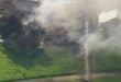 This screengrab handout from the Ministry of Defence provided by Japan's Jiji Press news agency on July 28, 2026, shows a building with smoke rising from it after an earthquake in Uki City, Kumamoto Prefecture.