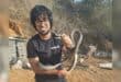 Akil Ramsurran holding up one of the black mambas from the Lion Park home owner. Photo: Supplied