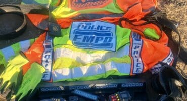 A search of the vehicle allegedly uncovered an unlicensed firearm loaded with ammunition, blue lights, and uniforms belonging to the Ekurhuleni Metro Police Department