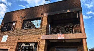 A photo of the outside of the flat after the fire had been successfully extinguished. Photo: Shorné Bennie