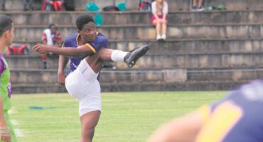 Lisakhanya Majola in action on the rugby field during a tournament. PhotoS: Supplied