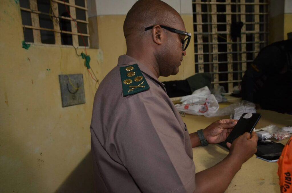 National Commissioner of Correctional Services Makgothi Thobakgale looks through contraband seized during the surprise intelligence-driven raid at Westville Correctional services on Thursday night. Photo: Supplied