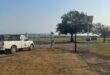 One of the FreeMe Wildlife Zululand vehicles at the main gate with the new electric gate and fence which surrounds the property. Photo: Supplied