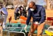 Richmond mayor Melikhaya Ngcongo and Nkumane high school principal Siyabonga Cele during a desk restoration programme.Photo Supplied