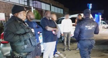 Rusa members with the hijacked individual of the Nissan. Photo: Reaction Unit South Africa