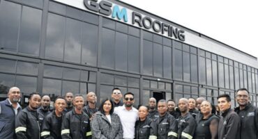 United by a shared vision, the GSM Roofing team stands together at the company’s new headquarters in Mkondeni. Their dedication, expertise and commitment to excellence have been instrumental in transforming a small family business into one of KwaZulu-Natal’s leading roofing manufacturers. Photo: Moeketsi Mamane