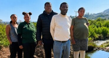 Residents of Smero are struggling without water and access to their homes due to a burst water pipe that has not been repaired. Photo: Shorné Bennie