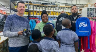 Fire victims receive school uniforms ahead of new school week