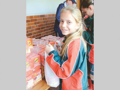 Robin Fourie (11) gave her 67 minutes on Mandela Day to the Lesego Primary School.