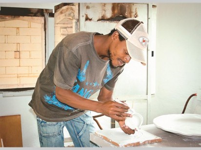 Clement Mkhize of Ceramic Art preparing his ceramics.