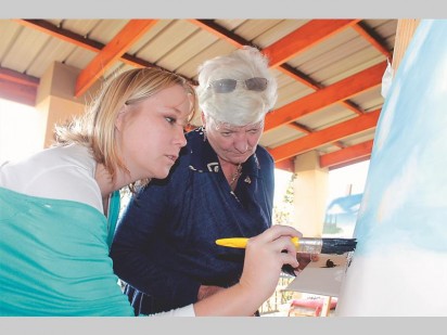 Nicole Hartley (left) giving guidance to Shaun Warner (right).