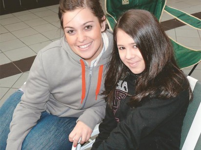 Jolandi van der Merwe and Olivia Angileri are waiting patiently for Computicket to open.