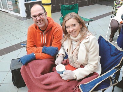 Alta Swart was waiting to buy tickets for her and her daughter and to keep her company, her good friend Charles Grant sat with her.