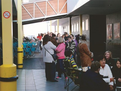 The queue outside the Money Market and Computicket booth at Checkers in the Anthos Centre where excited girls and scores of parents are waiting to buy their One Direction concert tickets.