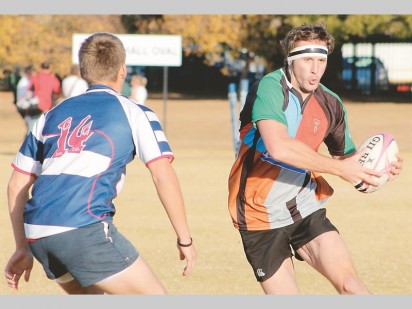 Dié Harlequins-speler lyk reg om doellyn toe te hardloop.