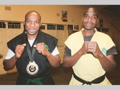 Sensei Bhekumuzi Khumbula (right) is happy to see his kickboxers such as Tebogo Matlhoko (left) taking part in a South African Kickboxing Challenge in Uitenhage in the Eastern Cape.