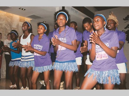 The Iponeng Cultural Group entertains the guests with their dance moves.