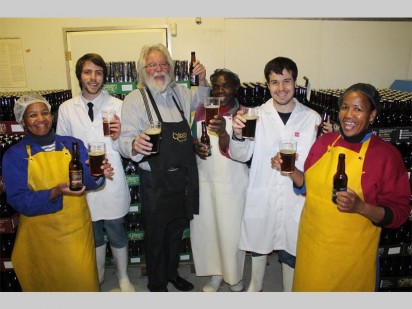 Staff members at the Gilroy's Brewery in Muldersdrift celebrating the news that James Bond author Jeffery Deaver confirmed the Gilroy's dark ale mentioned in his book is brewed by them. From the left are Elizabeth Simongo, Michael Biljon (brewery manager), Steve Gilroy, Lawrence Sigama, Kyle Cloete and Margaret Ndhlebe.