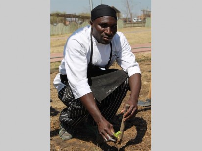Emmanuel Ngwira at work in the garden at Riverstone Lodge.