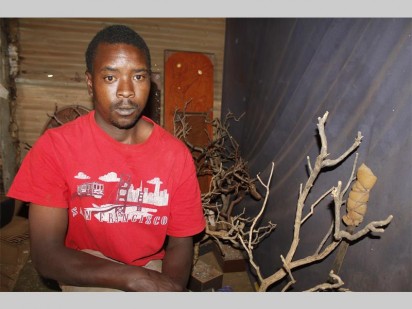 Bube Mvenya, who sells products from materials he gets from the Munsieville area to keep food on the table has no problem with the Coronation Park squatters living among them.