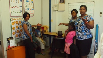 Dieketseng Moretsi, Betty Nkoana (operations manager) and Boitumelo Molese, employees of the shows their dissapointment with the burglary. They are here with some of the Centre's children Siphamandla Ntlengethwa, Phenga Dino, Ngyabanga Donnis and Faith Mawodzeka.