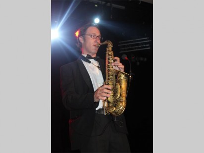 Eustace Wilken takes to the stage with his impressive saxophone performance.