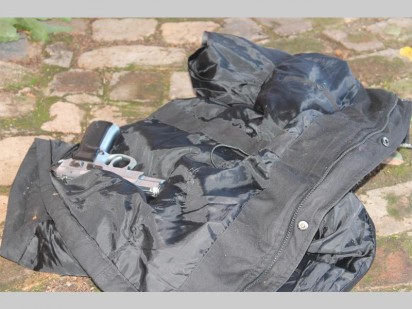 One of the suspects' gun.