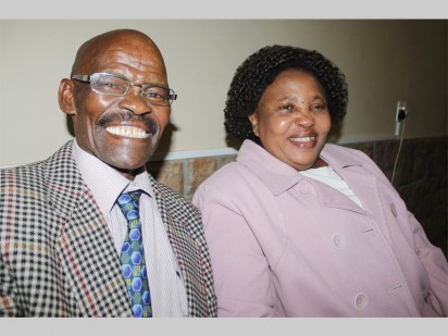 Ishmael Lekaota has reason to smile as he received a special award for 40 years of dedicated service. Here he is enjoying the moment with his wife Mirriam.