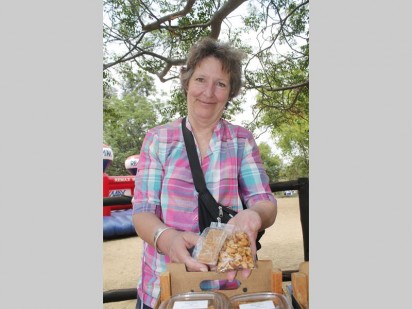 Kerry Hill enjoys the day while selling some goods to the public.