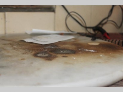 White powder trails all over the kitchen of the house.