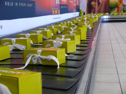 DKNY perfume hampers were waiting for the passengers on the luggage carousel.