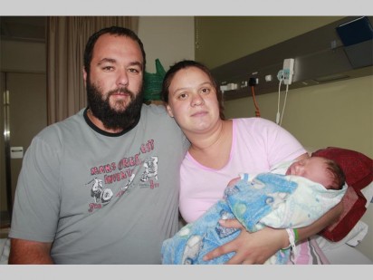Baby Dian Cordier with his parents Dirk and Annamarie.