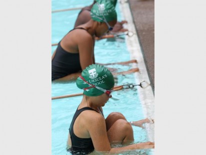 Isabella de Sousa and Chloe Preston having a good time in the pool.