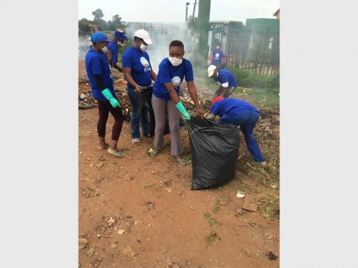 DA activists cleaning up an illegal dump in Munsieville.